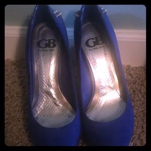 Wedges with zipper, spikes and leopard on the back